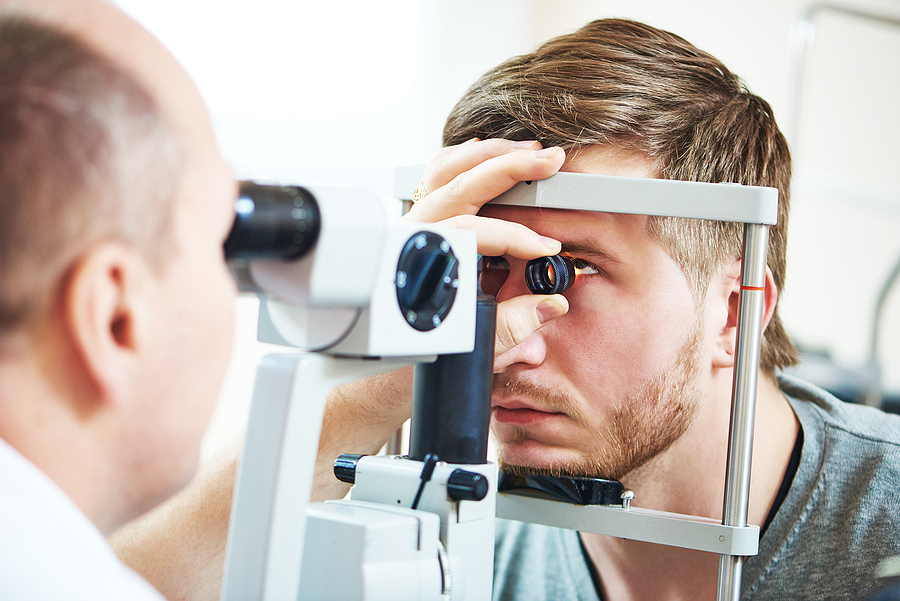 Ophthalmology Male patient under eye vision examination